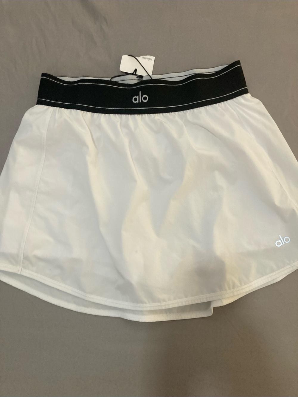 ALO Yoga match point White Skort with Black Elastic Waistband